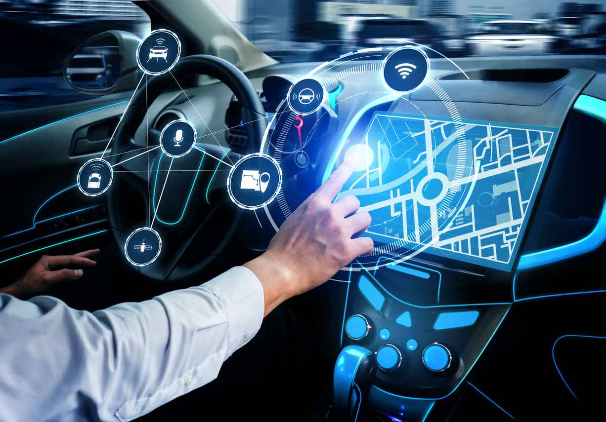 Driverless car interior with futuristic dashboard for autonomous control system; The Role of Optical Bonding in Transportation Displays